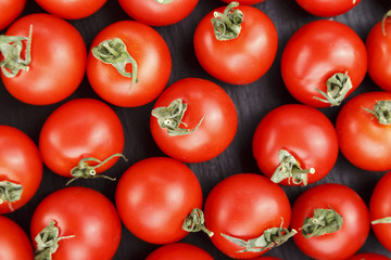  Fresh tomatoes. It can be used as background. (selective focus).Delicious red tomatoes.