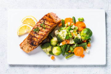 Grilled salmon fillet with vegetables mix. 