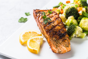 Grilled salmon fillet with vegetables mix. 