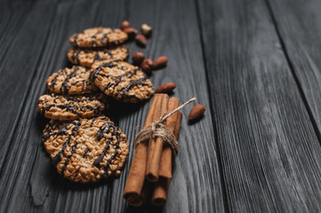 Obraz na płótnie Canvas Homemade cookies dessert. Chocolate chip, oatmeal raisin, dough and nuts. Copy text menu food background.