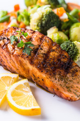 Grilled salmon fillet with vegetables mix. 