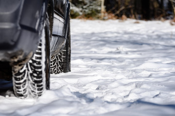 offroad car tires stuck in the snow