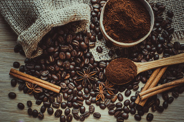 A cup of latte coffee and coffee beans. Toning.