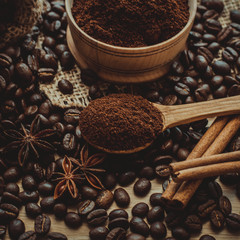 A cup of latte coffee and coffee beans. Toning.