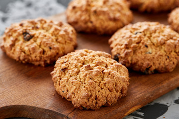 Top view close-up picture of tasty cookies on the cutting board, shallow depth of field, selective focus