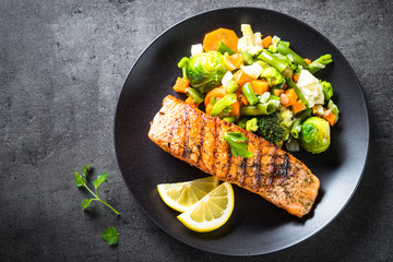 Grilled salmon fillet with vegetables mix. 