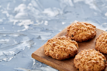 Top view close-up picture of tasty cookies on the cutting board, shallow depth of field, selective focus