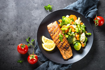 Grilled salmon fillet with vegetables mix. 