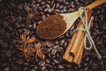 A cup of latte coffee and coffee beans. Toning.