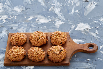 Top view close-up picture of tasty cookies on the cutting board, shallow depth of field, selective focus