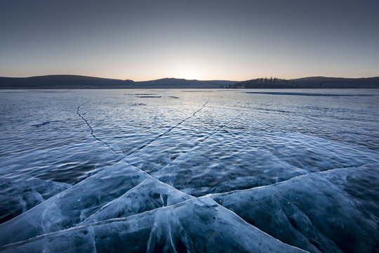 sunrise over frozen lake Khuvsgul in northern Mongolia
