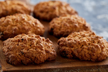 Top view close-up picture of tasty cookies on the cutting board, shallow depth of field, selective focus