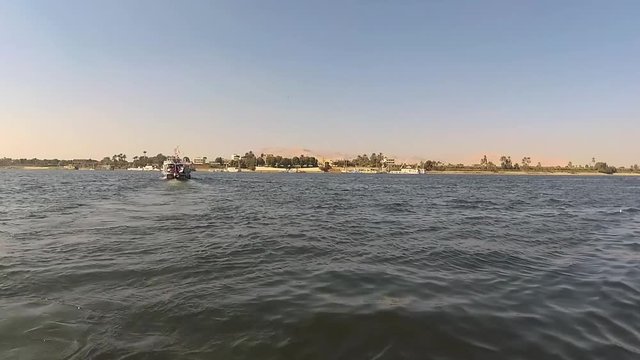 Wide angle video of Egyptian river Nile and sailing boat. Video footage shot with action camera.