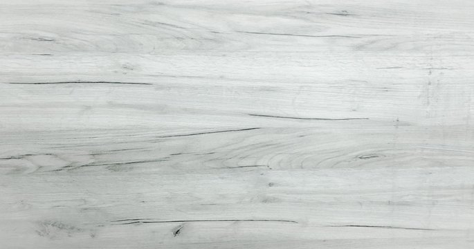 Light soft wood surface as background, wood texture. Grunge washed wood planks table pattern top view.