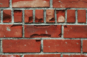 Old brick wall, old texture of red stone blocks closeup, loft style