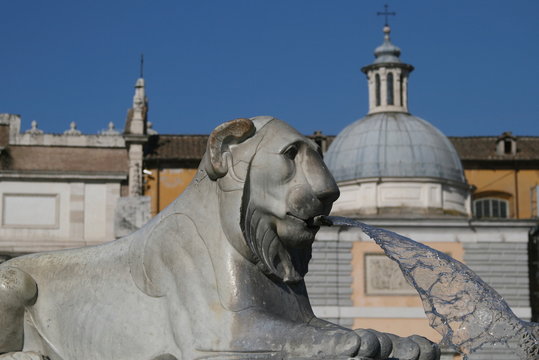 sculpture fountan of lion in the italian city Rome Italy