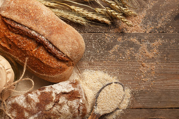 Fresh bread on the village table. Ingredients.