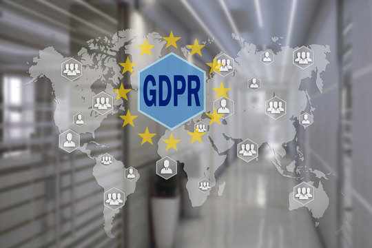 GDPR  on the touch screen with a blur background of the office.The concept of General Data Protection Regulation