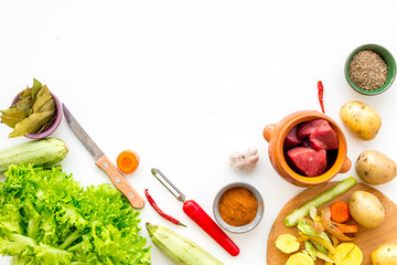 cut vegetables for cooking ragout or ratatouille for healthy dinner white background top view space...