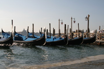 Fototapeta na wymiar Venetian boats on the grand canal at the venice italy during the vacation 