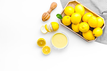 homemade lemon curd cooking on white background top view mock up