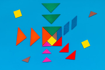 Business solutions, success and strategy. Puzzle with paper pieces office desk blue background top view pattern