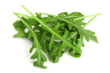 Heap of Green fresh rucola or arugula leaf isolated on white background