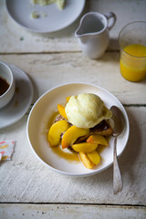Peach cobbler with ice cream
