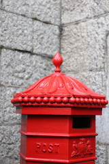 old red vintage post box for letters in the London street, Great Britain