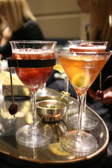 alcohol cocktails in glass in bar during the party