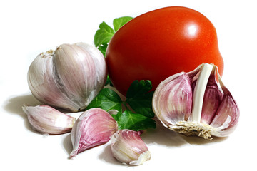 fresh tomato, garlic and parsley leaves, isolated on white background