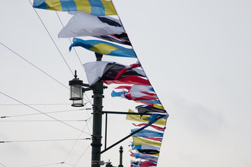 Colorful maritime signal flags on street