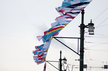 Colorful maritime signal flags on street