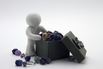 Clay character and jewelry box. Isolated onwhite background