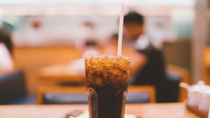  glass with coca cola and ice close-up.
