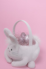 Easter basket filled with glittery eggs