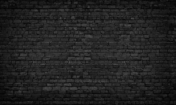 black brick wall background. texture dark masonry