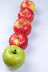 Apples, red apples on a white wooden background, fruits for breakfast, vitamins, vegetarian food, healthy food, American breakfast, lots of apples for designer, copy space, minimalism