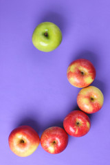 Apples pop art, red apples on a purple background, fruits for breakfast, vitamins, vegetarian food, healthy food, American breakfast, lots of apples for designer, minimalism, ultraviolet