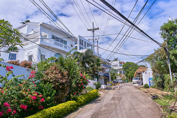 Fototapeta na wymiar Small road in the village on Boracay island, Philippines