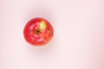 Apple, fruit pop art, red apple on a pink background, fruit for breakfast, vitamins, vegetarian food, pastel background, minimalism, blank for a designer, Asian food, American breakfast