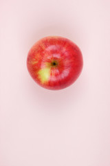 Apple, fruit pop art, red apple on a pink background, fruit for breakfast, vitamins, vegetarian food, pastel background, minimalism, blank for a designer, Asian food, American breakfast