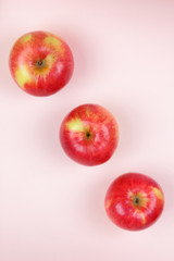 Apple, fruit pop art, red apple on a pink background, fruit for breakfast, vitamins, vegetarian food, pastel background, minimalism, blank for a designer, Asian food, American breakfast