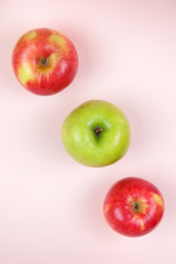 Apple, fruit pop art, red apple on a pink background, fruit for breakfast, vitamins, vegetarian food, pastel background, minimalism, blank for a designer, Asian food, American breakfast