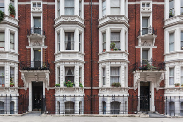 a beautiful view of victorian building in the center of London