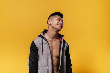 Portrait of young asian boy with fitness body.