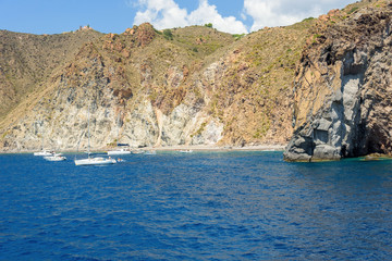 Small beach amongst the cliffs on Lipari Island