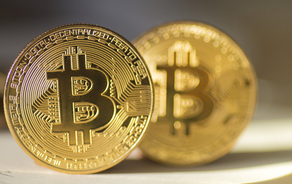 Golden Bitcoins, new virtual money - Stock image