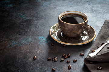 Cup of coffee on a rusty background
