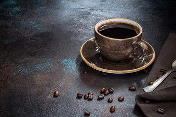 Cup of coffee on a rusty background